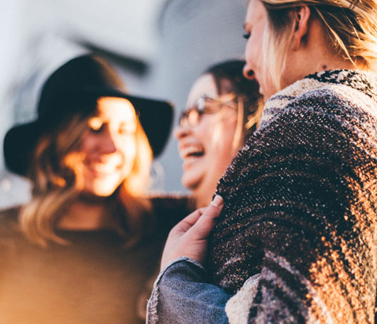 A Group of Women Laugning